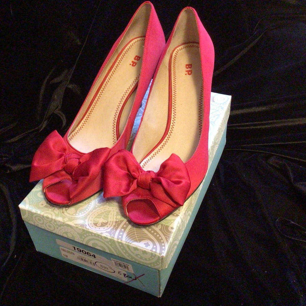 BP red, satin finish, mid-size heels with fun bows